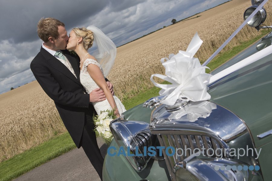 beautiful couple and car