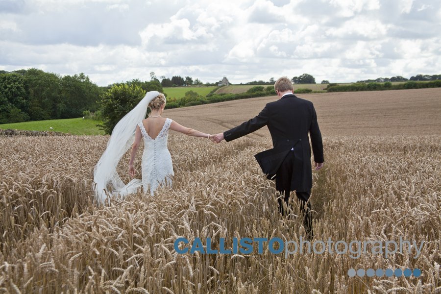 bride and groom wheat field