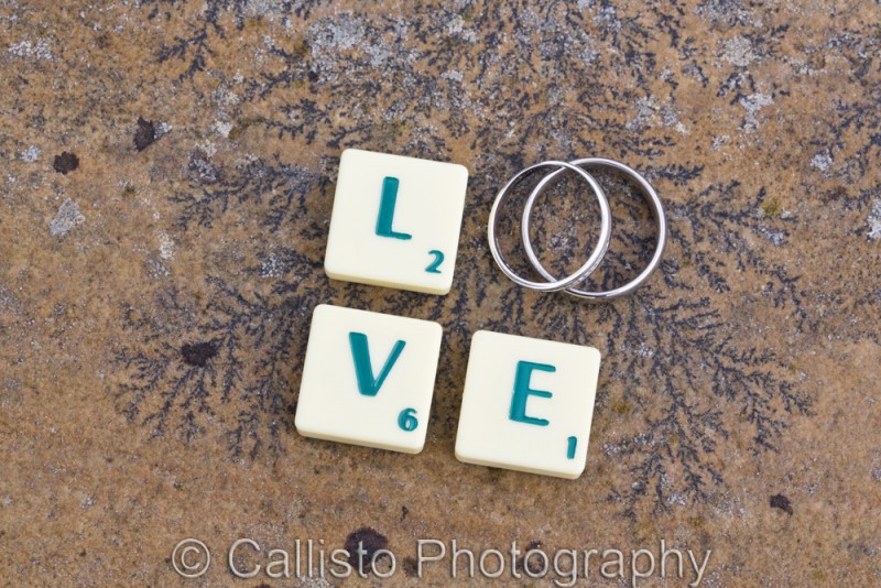 scrabble tiles and wedding bands