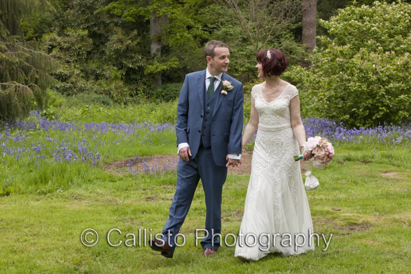 bride and groom woodland walk