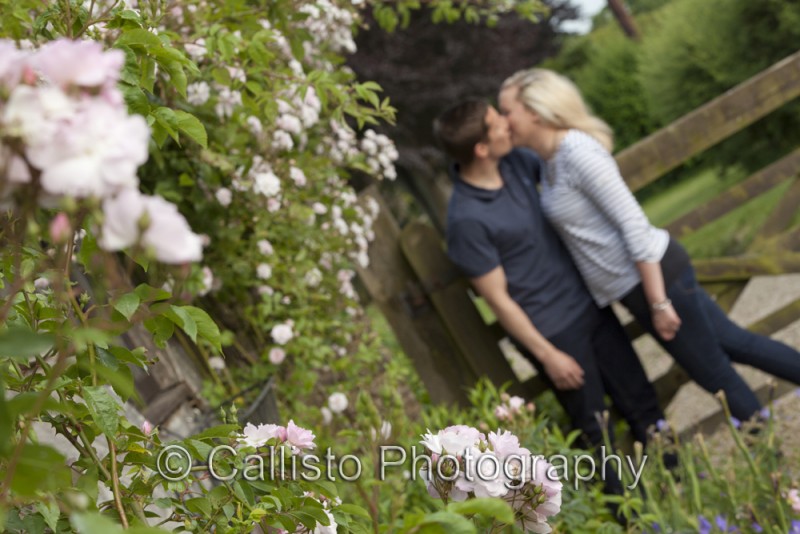couple with flowers narrow depth of field