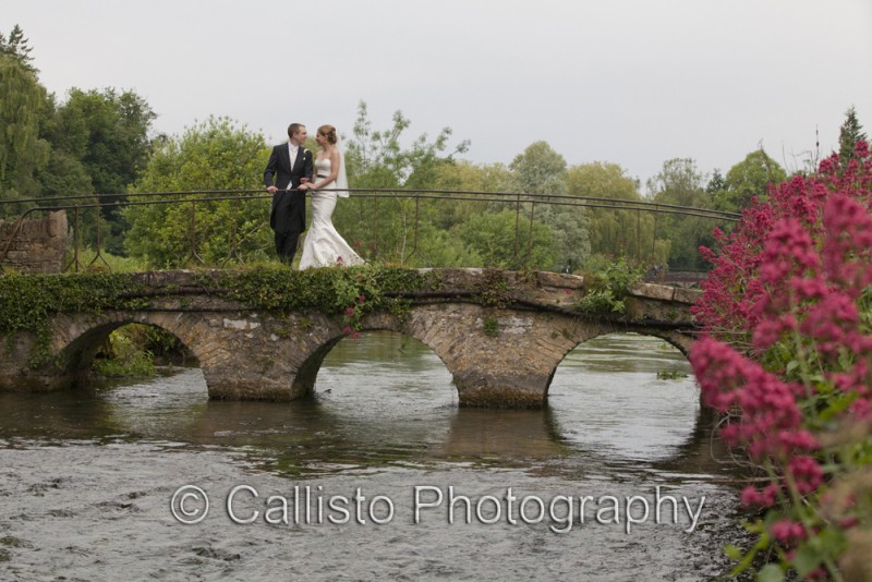 cotswold stone bridge and newly weds