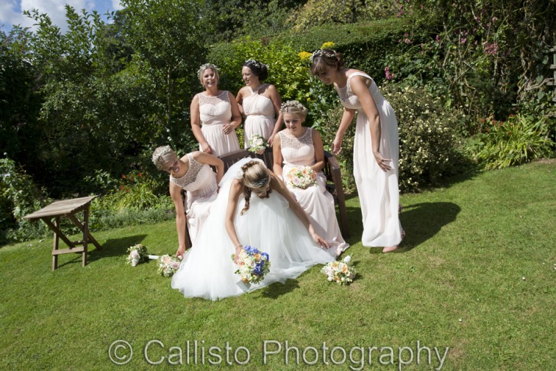 bride and maids having a sit down