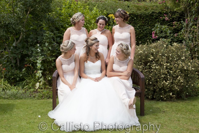 brides party on bench
