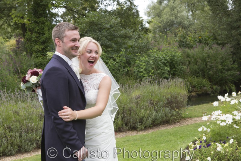 surprised newlyweds in Bibury