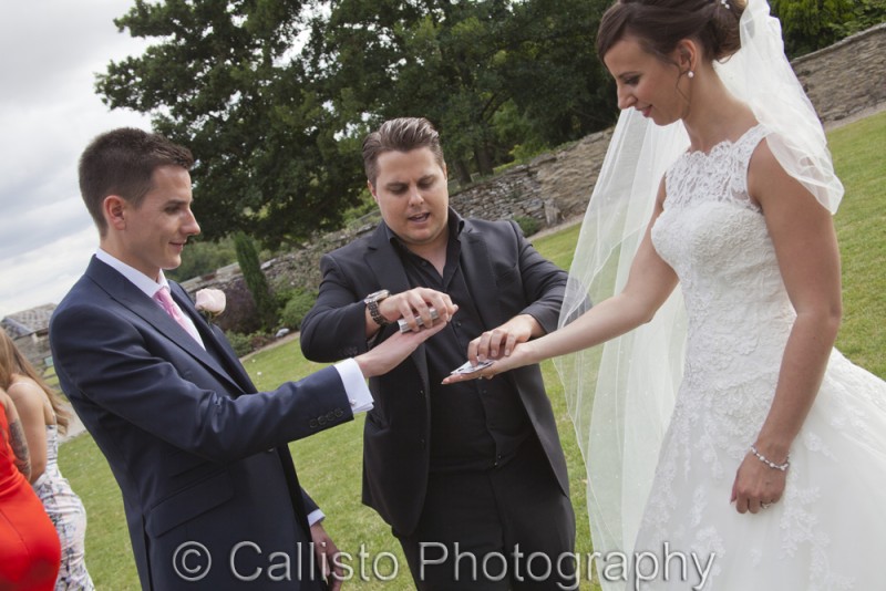Magician with bride and groom