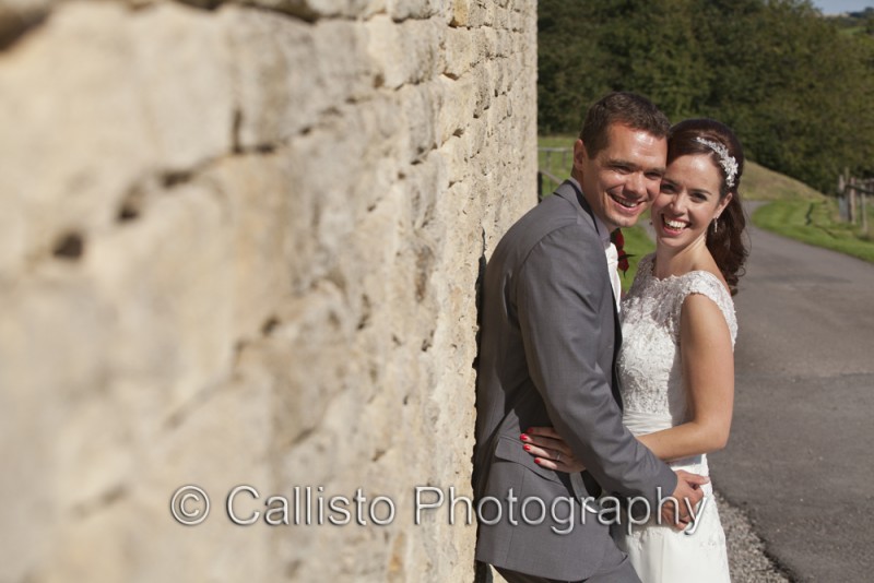 Beaming smiles from one very happy couple at Kingscote Barn