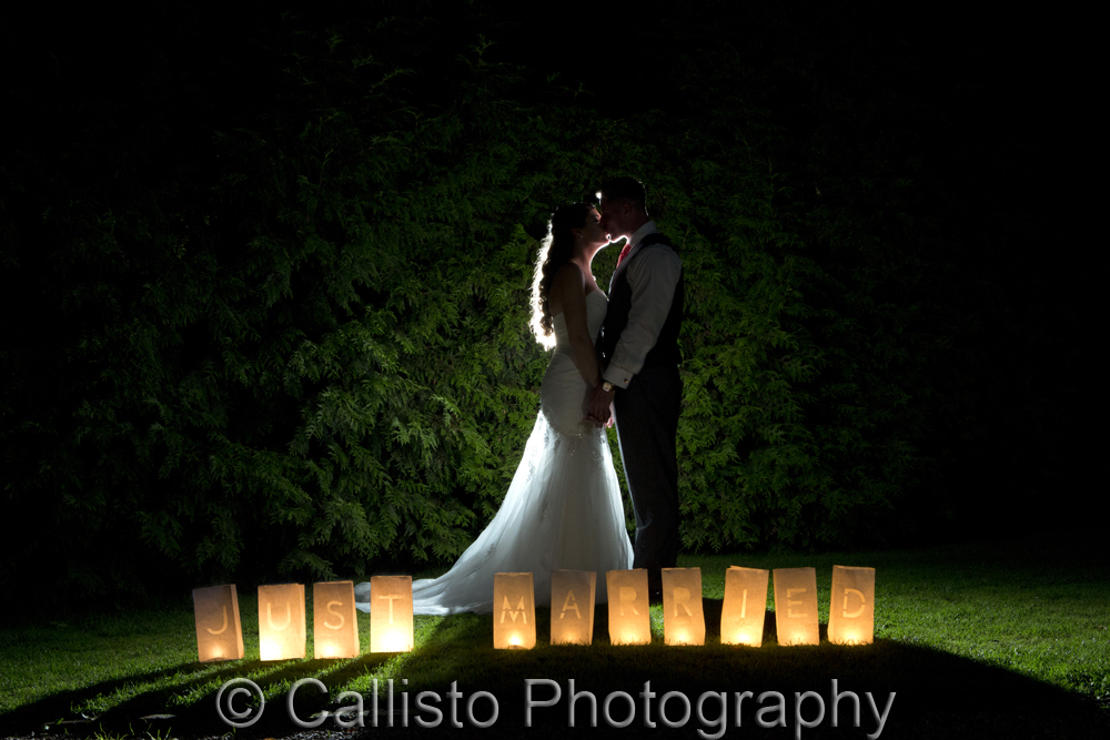 Candle lantern bags with illuminated words 'Just Married'