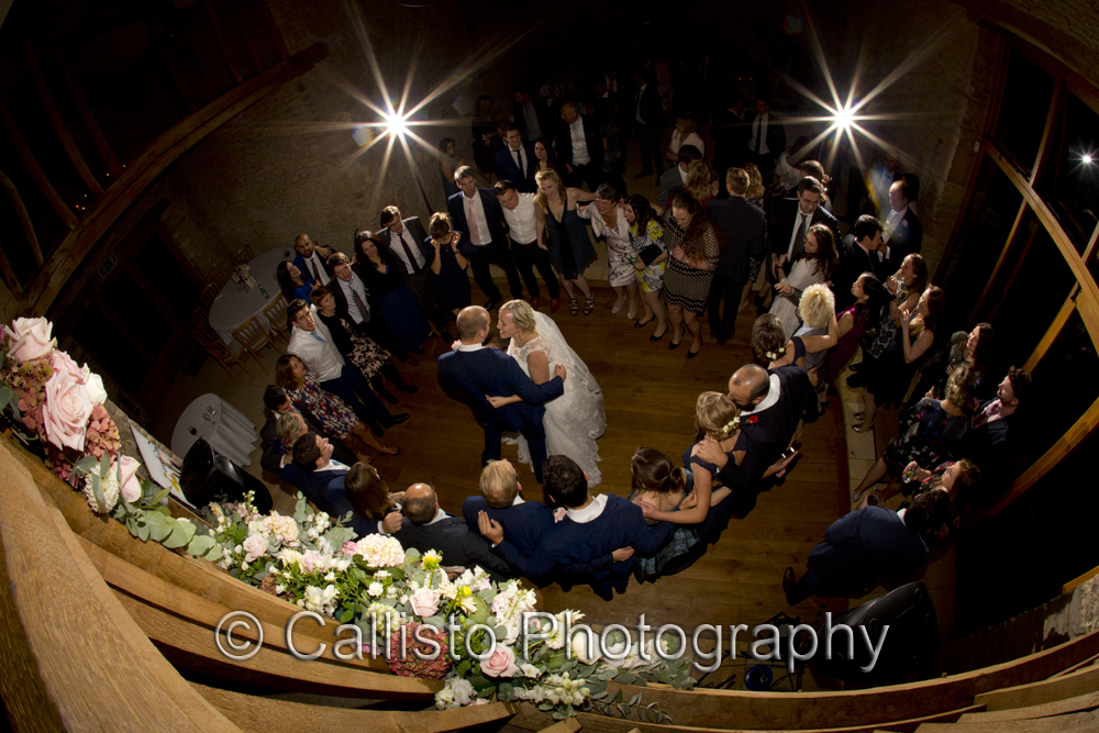 Shot taken from the gallery at Kingscote Barn of the first dance, great perspective